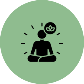 Silhouette meditating with a lotus symbol in a speech bubble on green background.